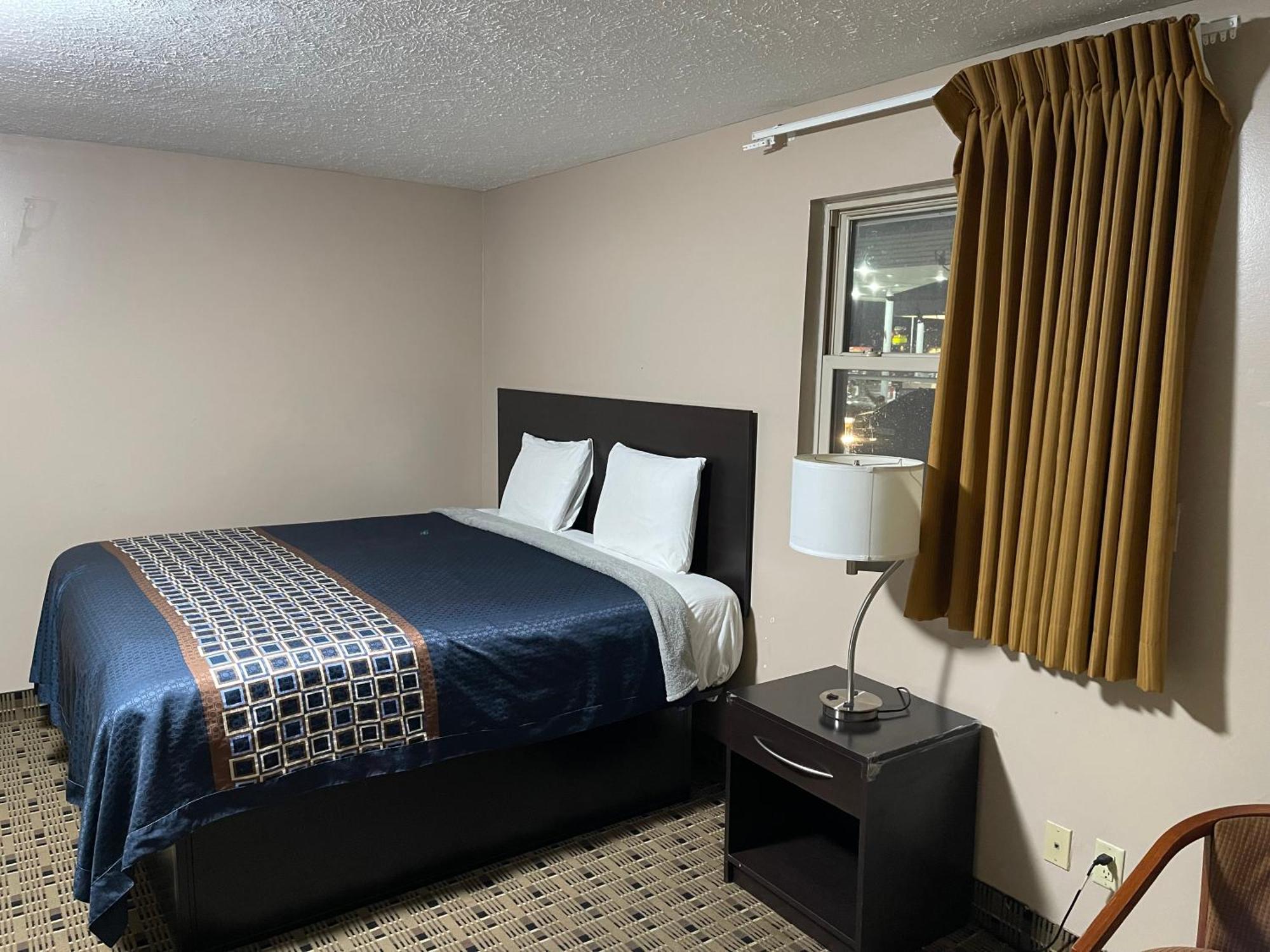 Economy Inn & Suites Ащабюла Екстериор снимка