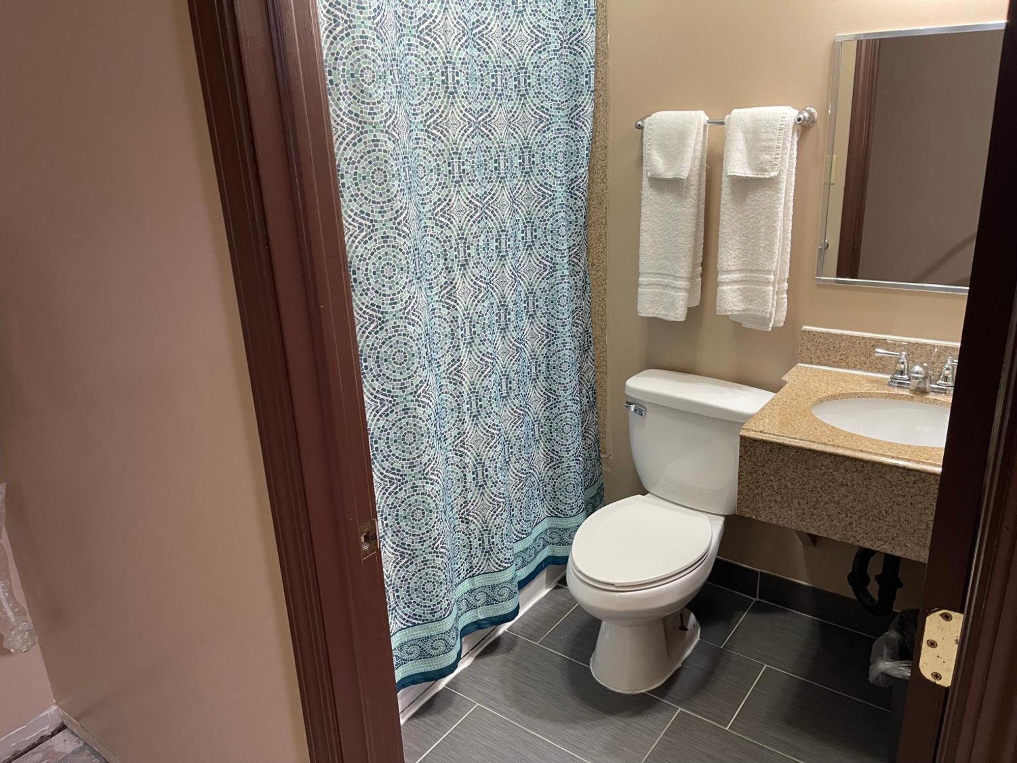 Economy Inn & Suites Ащабюла Екстериор снимка