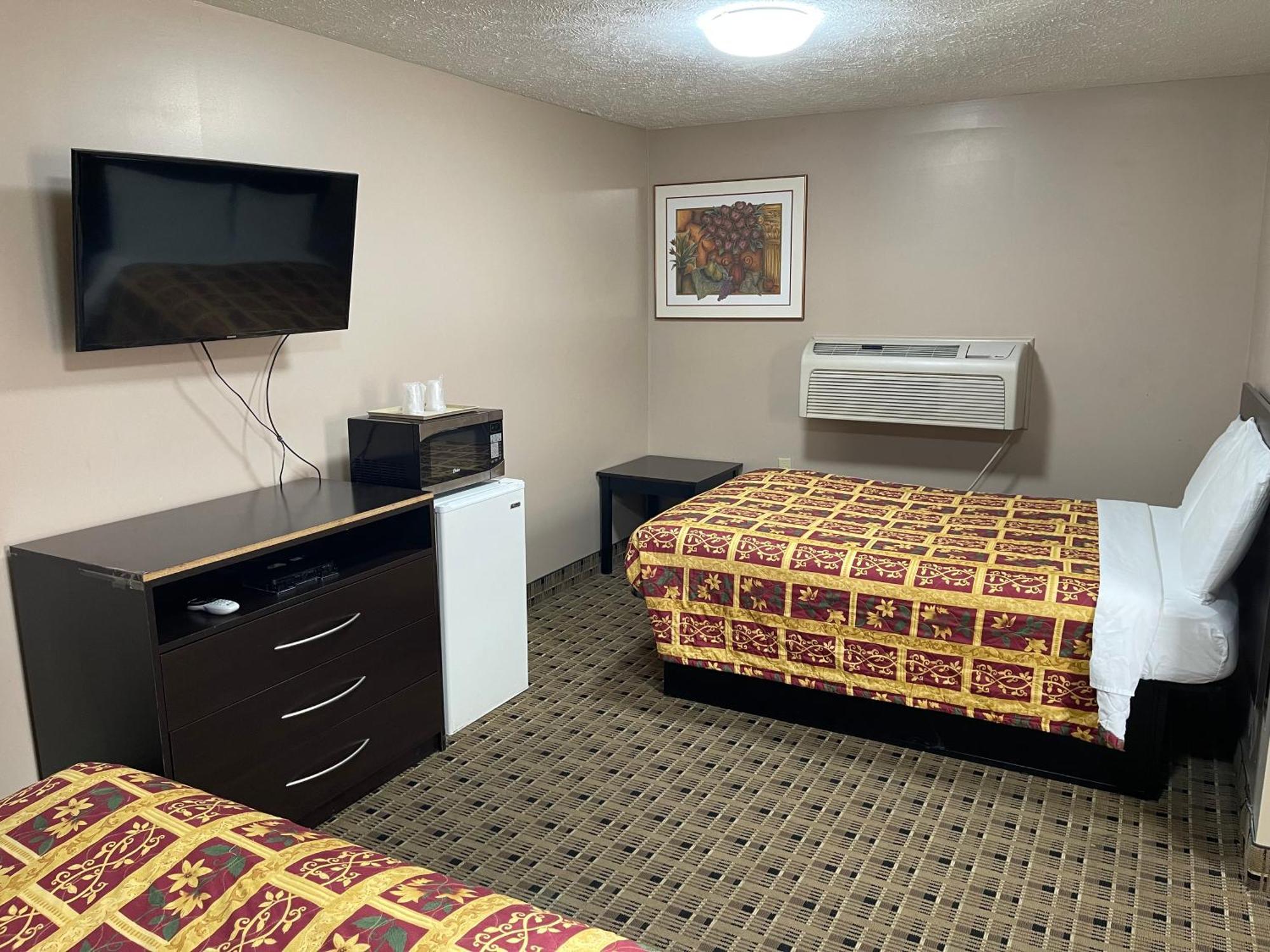 Economy Inn & Suites Ащабюла Екстериор снимка