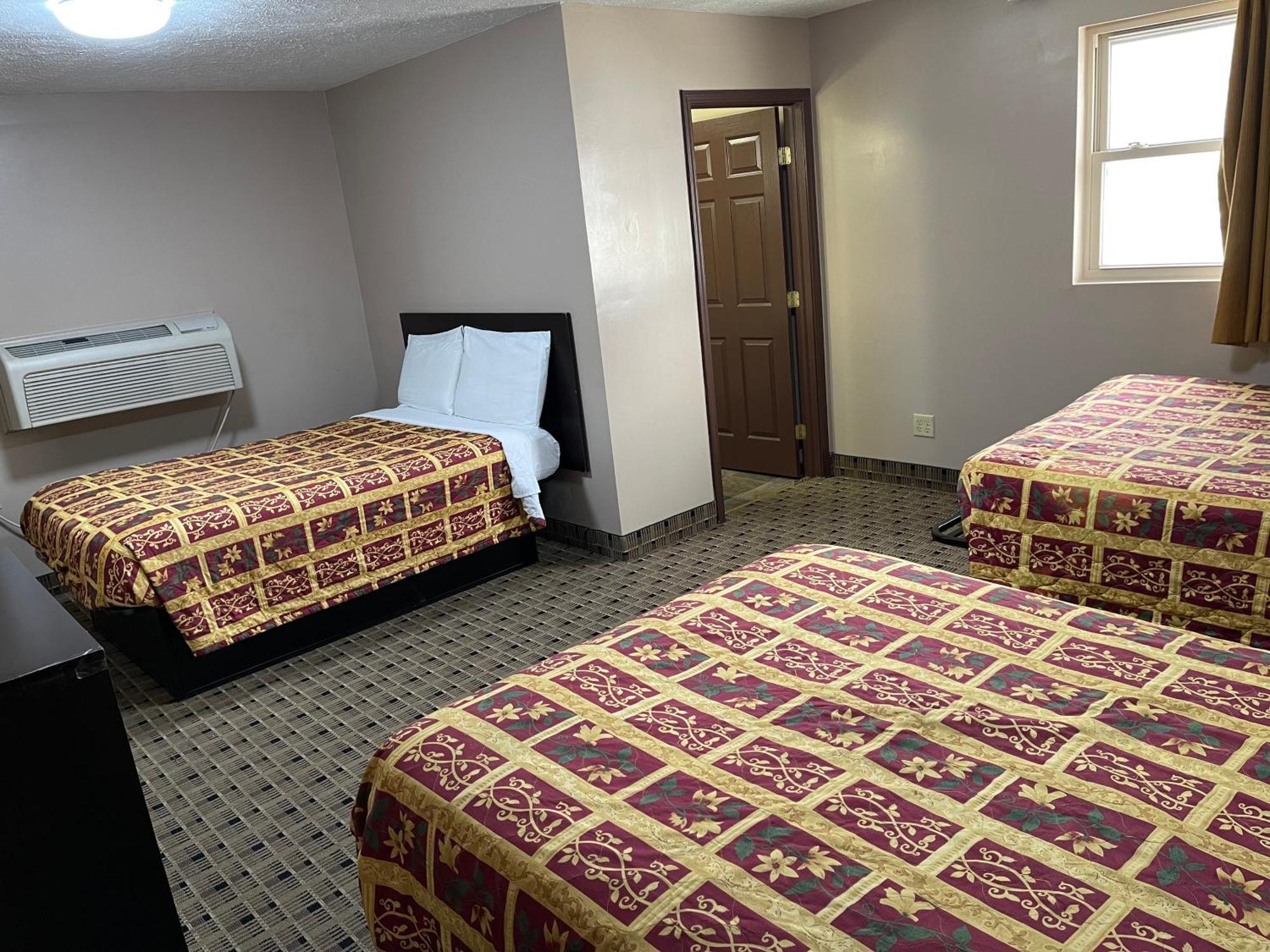 Economy Inn & Suites Ащабюла Екстериор снимка
