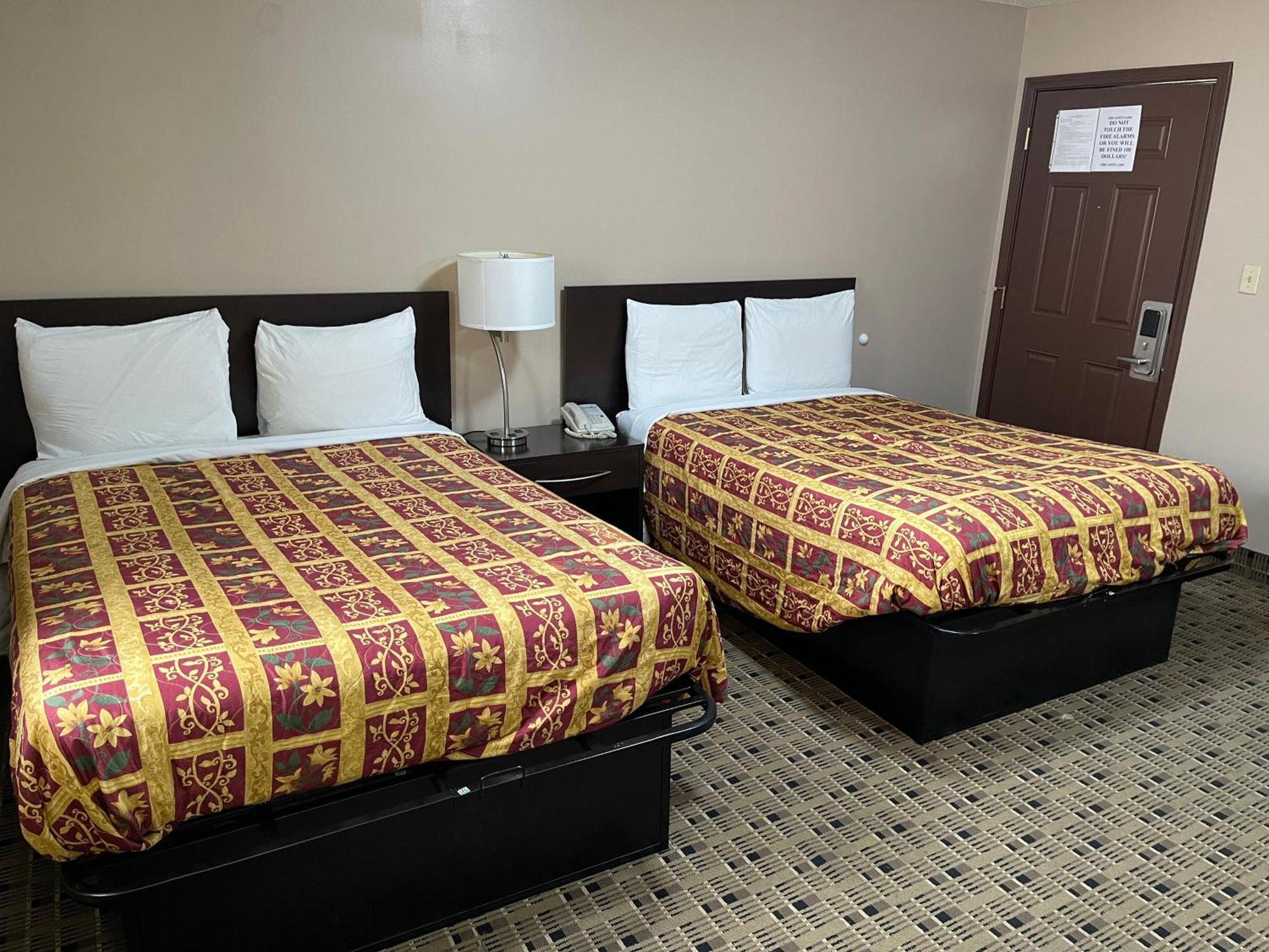 Economy Inn & Suites Ащабюла Екстериор снимка