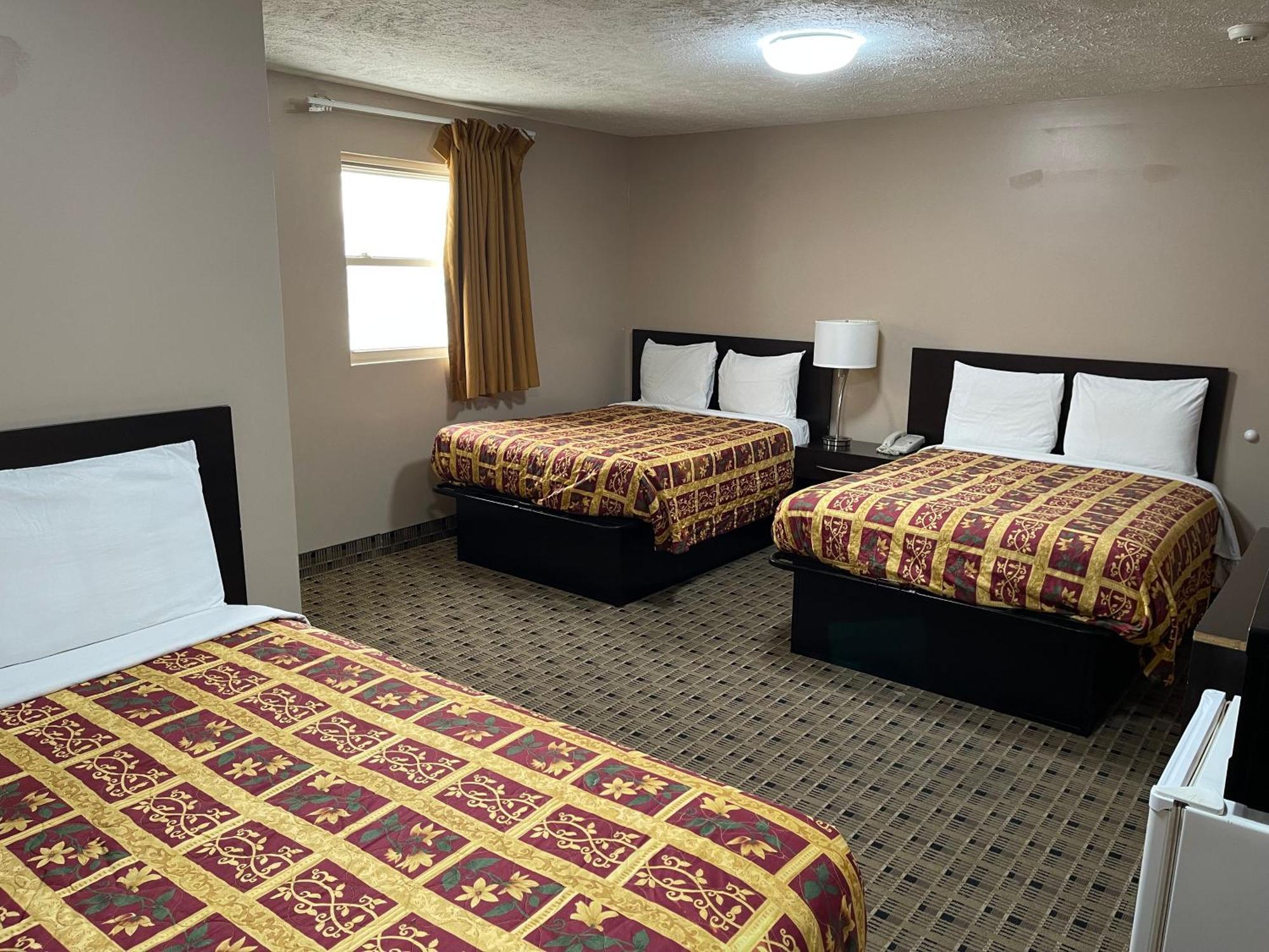 Economy Inn & Suites Ащабюла Екстериор снимка