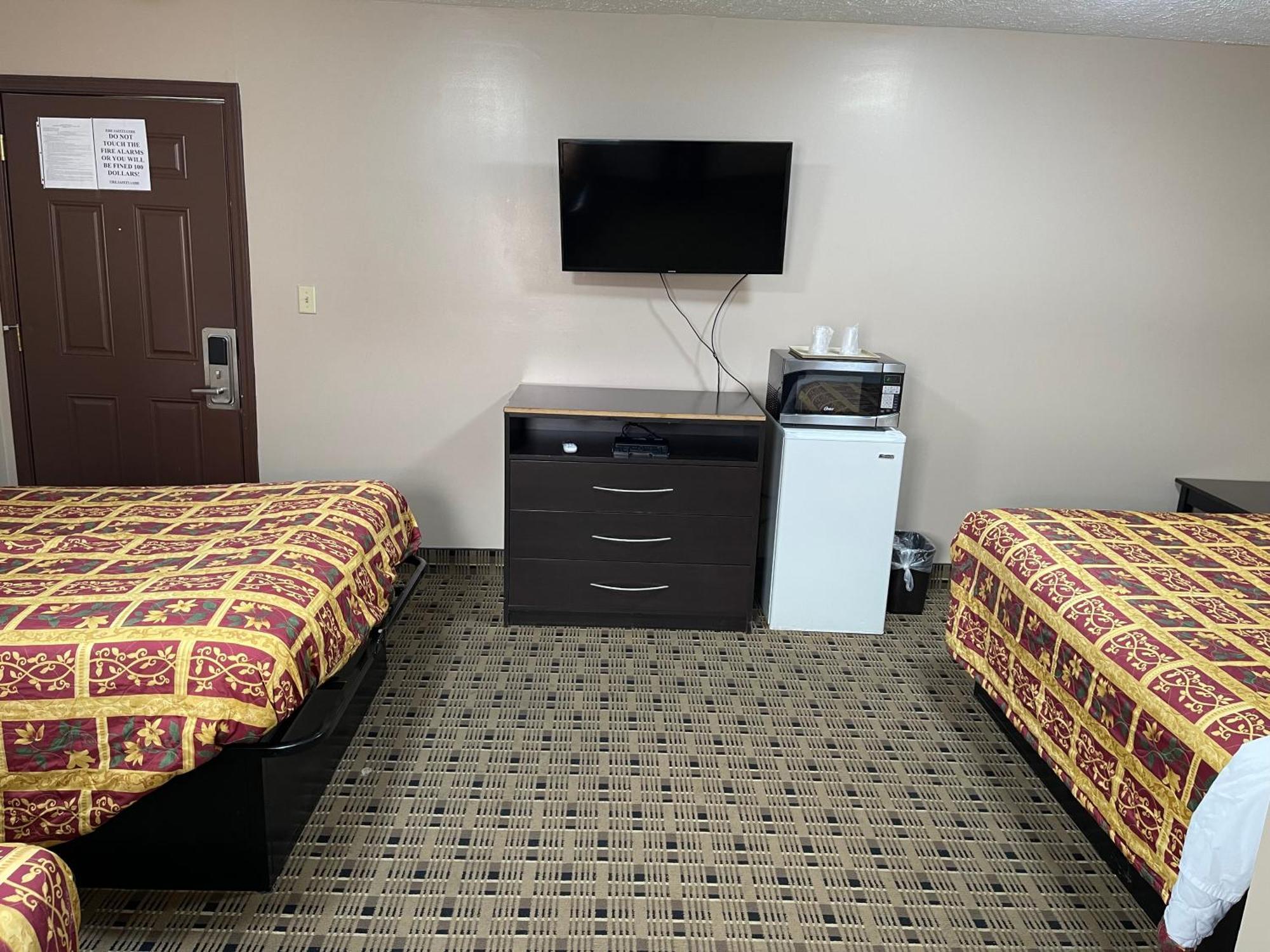 Economy Inn & Suites Ащабюла Екстериор снимка