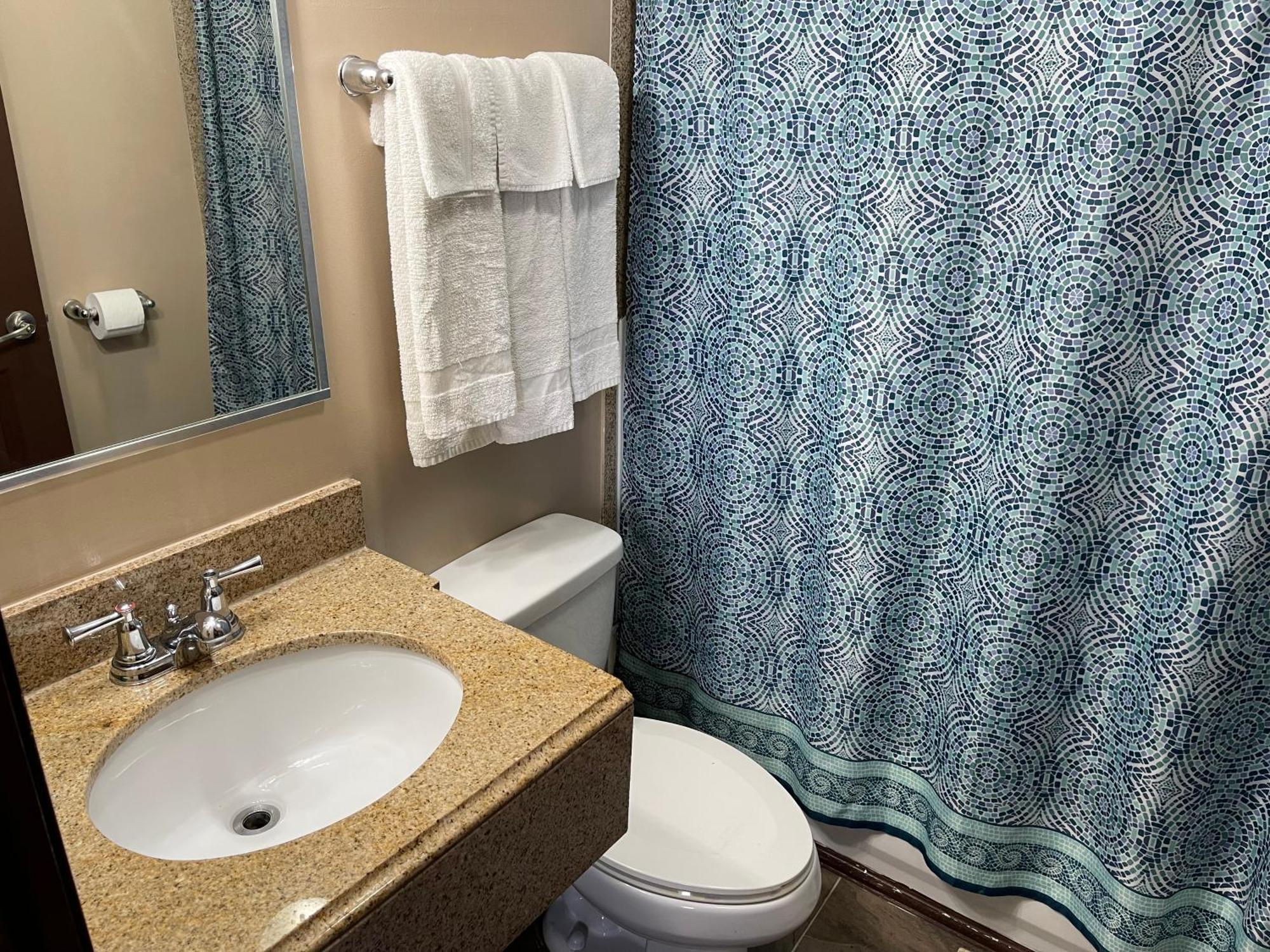 Economy Inn & Suites Ащабюла Екстериор снимка
