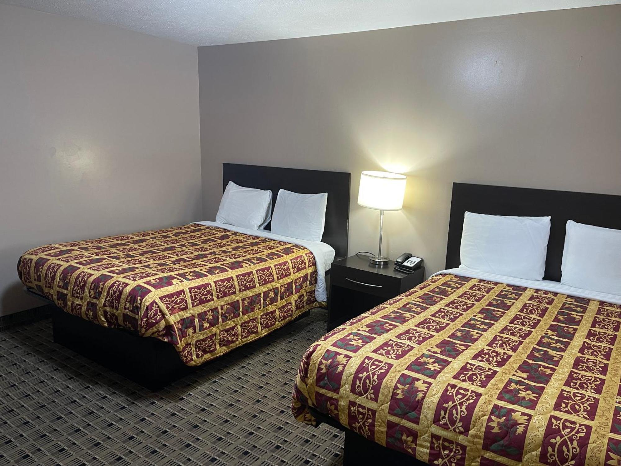 Economy Inn & Suites Ащабюла Екстериор снимка