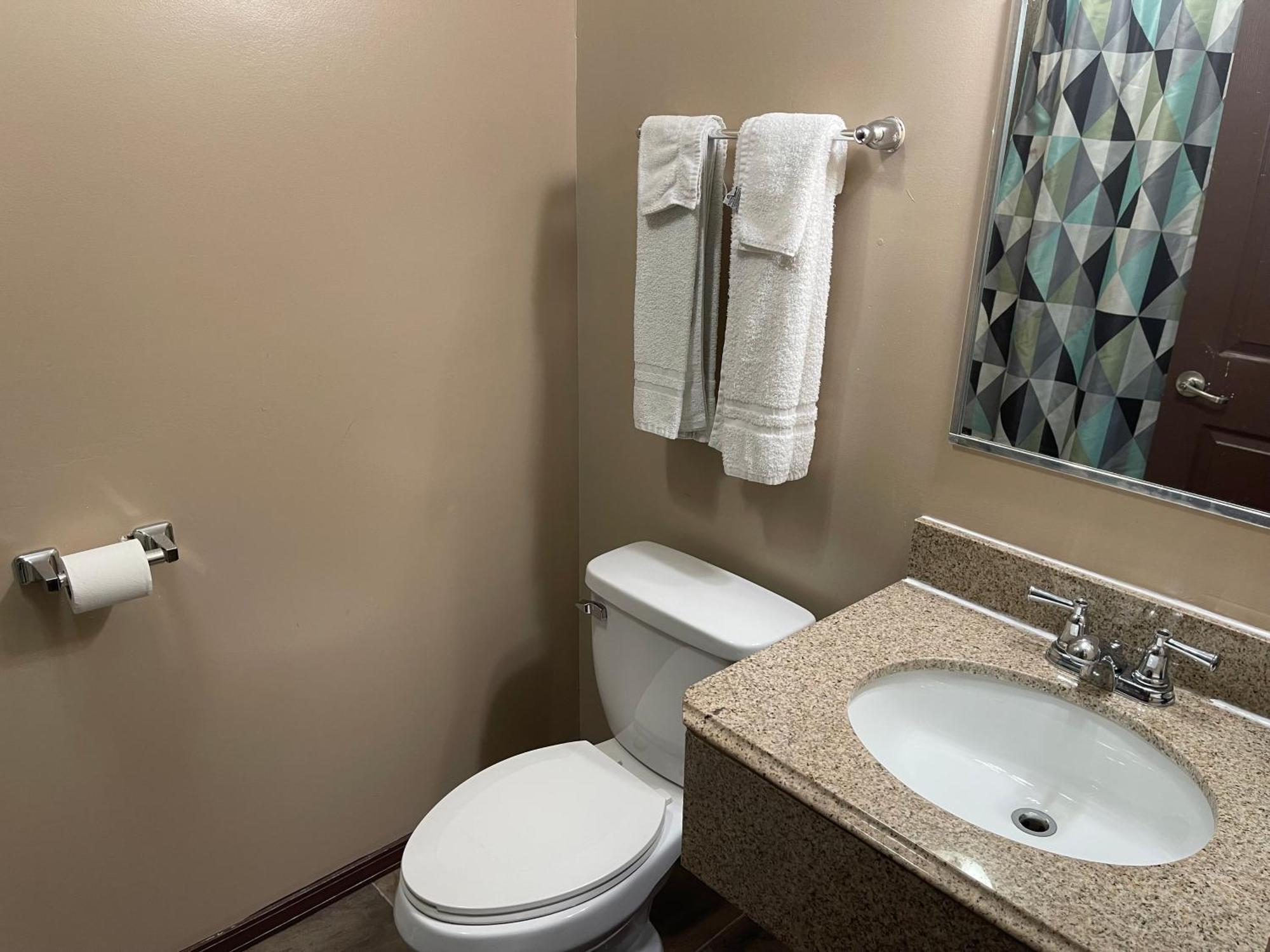 Economy Inn & Suites Ащабюла Екстериор снимка