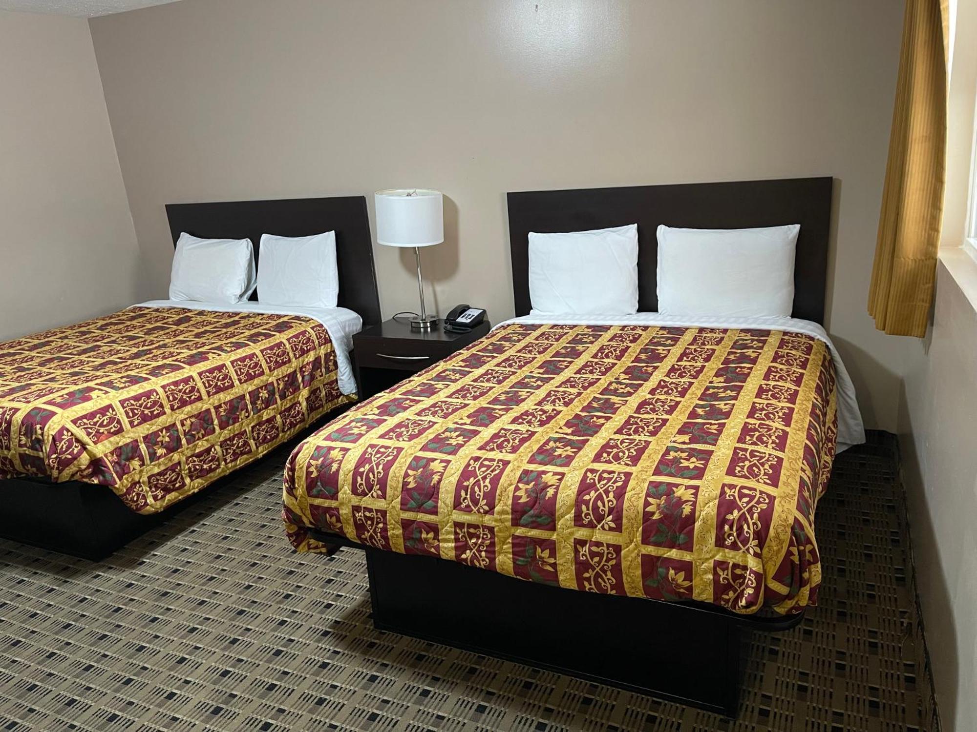 Economy Inn & Suites Ащабюла Екстериор снимка
