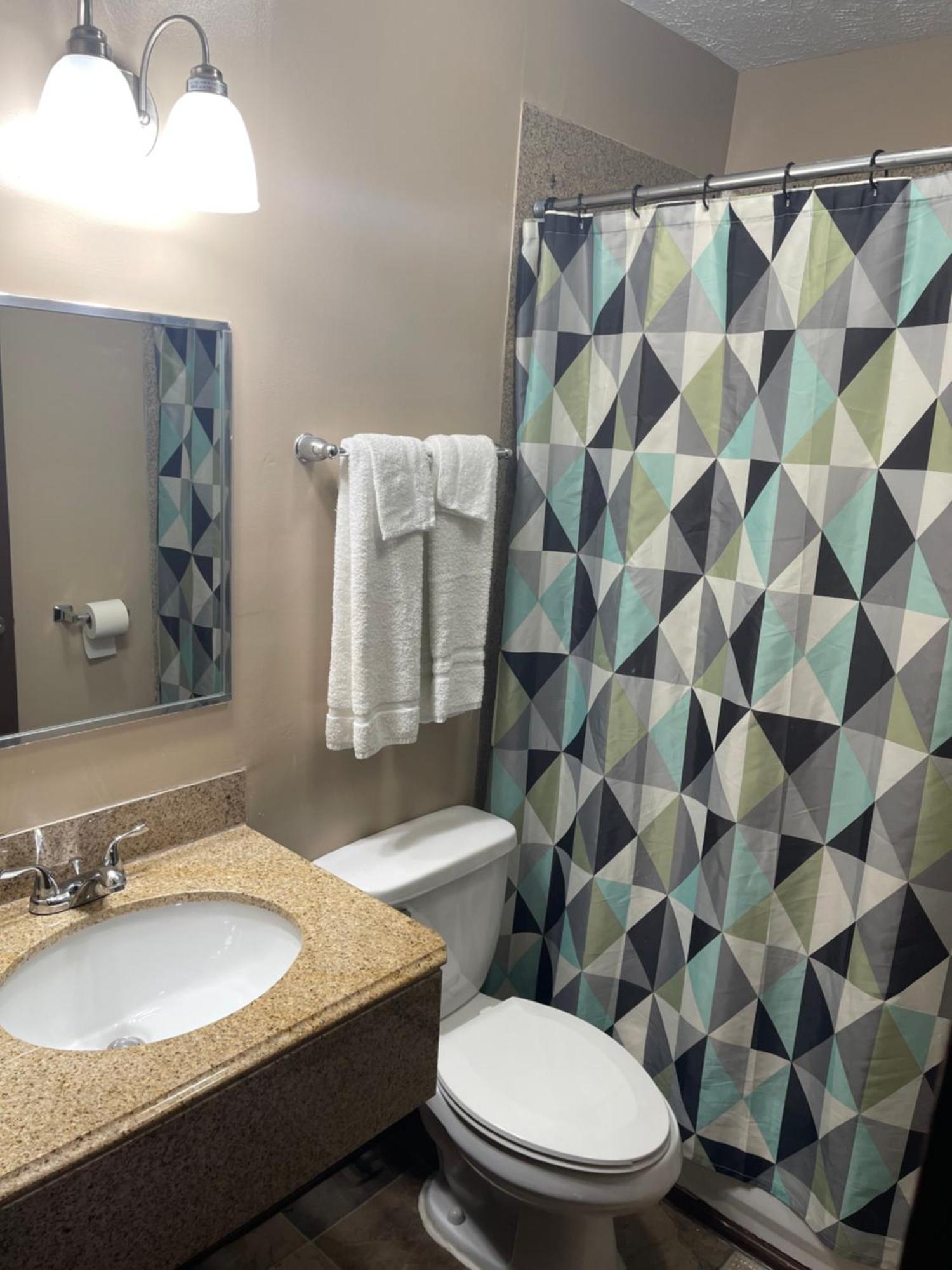 Economy Inn & Suites Ащабюла Екстериор снимка