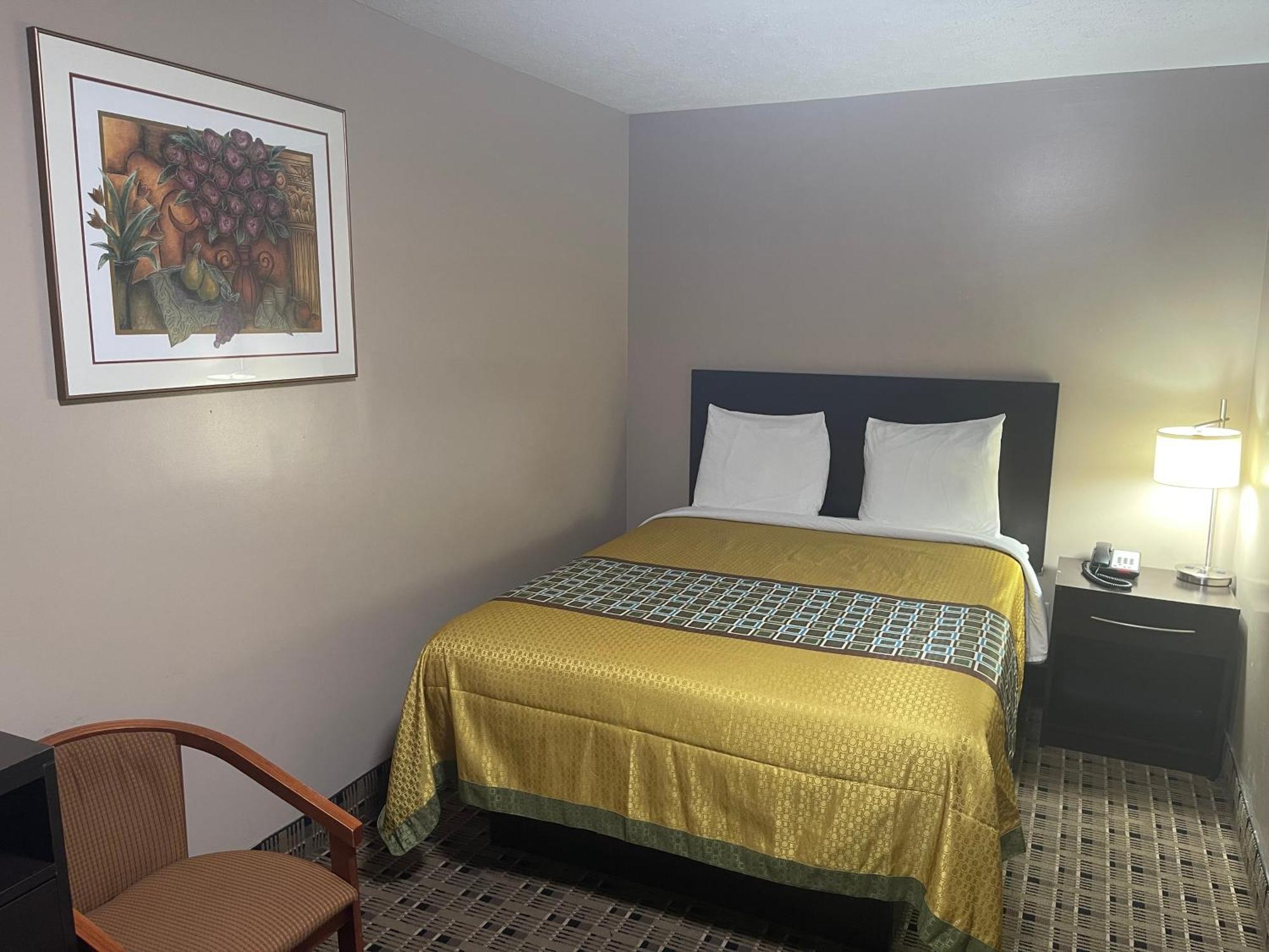 Economy Inn & Suites Ащабюла Екстериор снимка