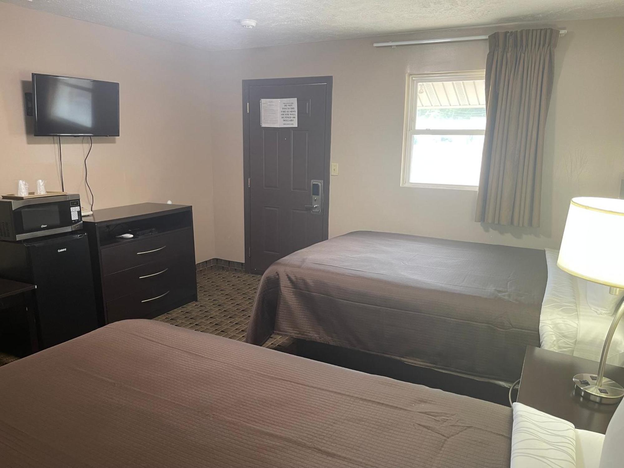 Economy Inn & Suites Ащабюла Екстериор снимка