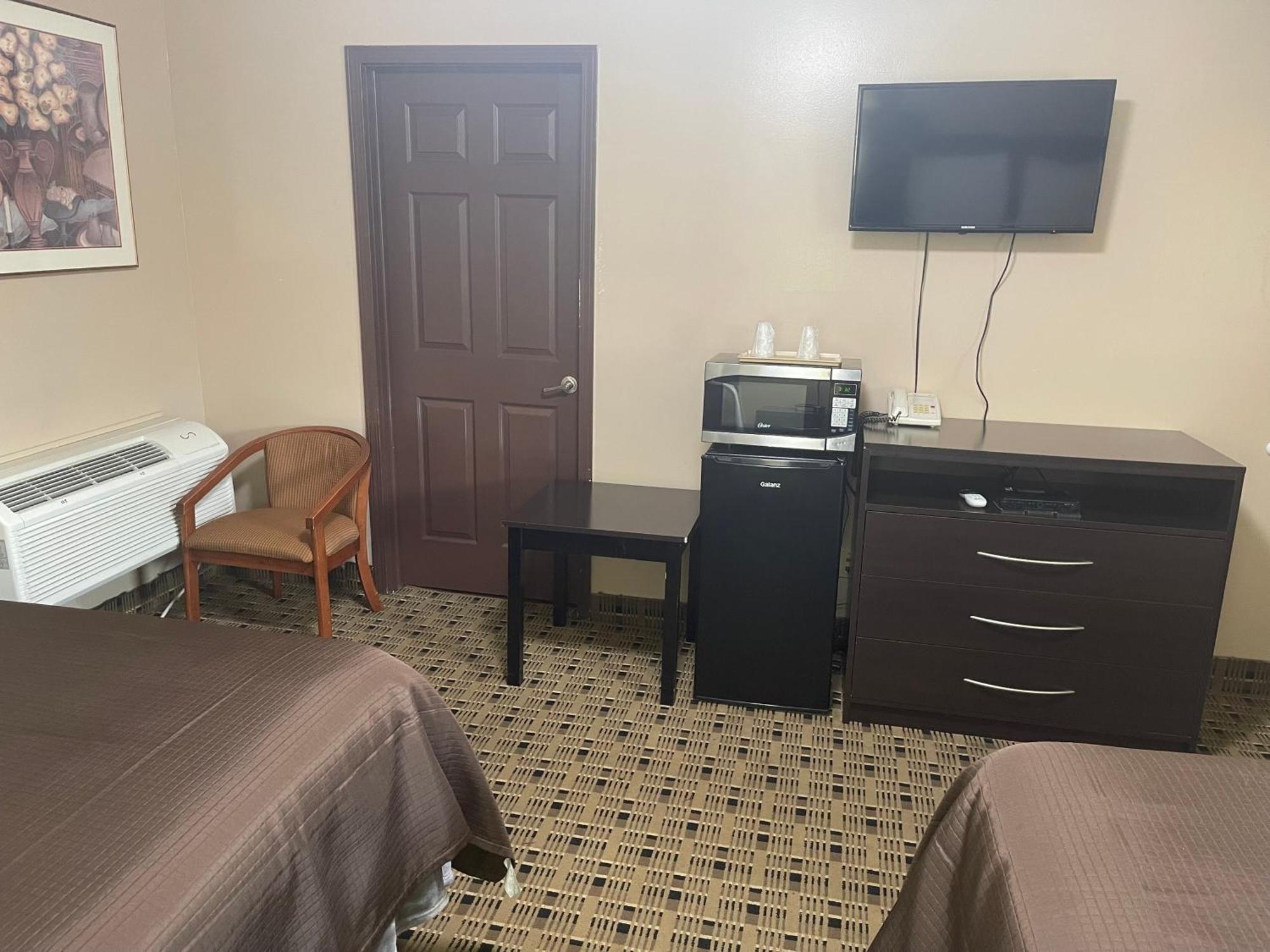 Economy Inn & Suites Ащабюла Екстериор снимка