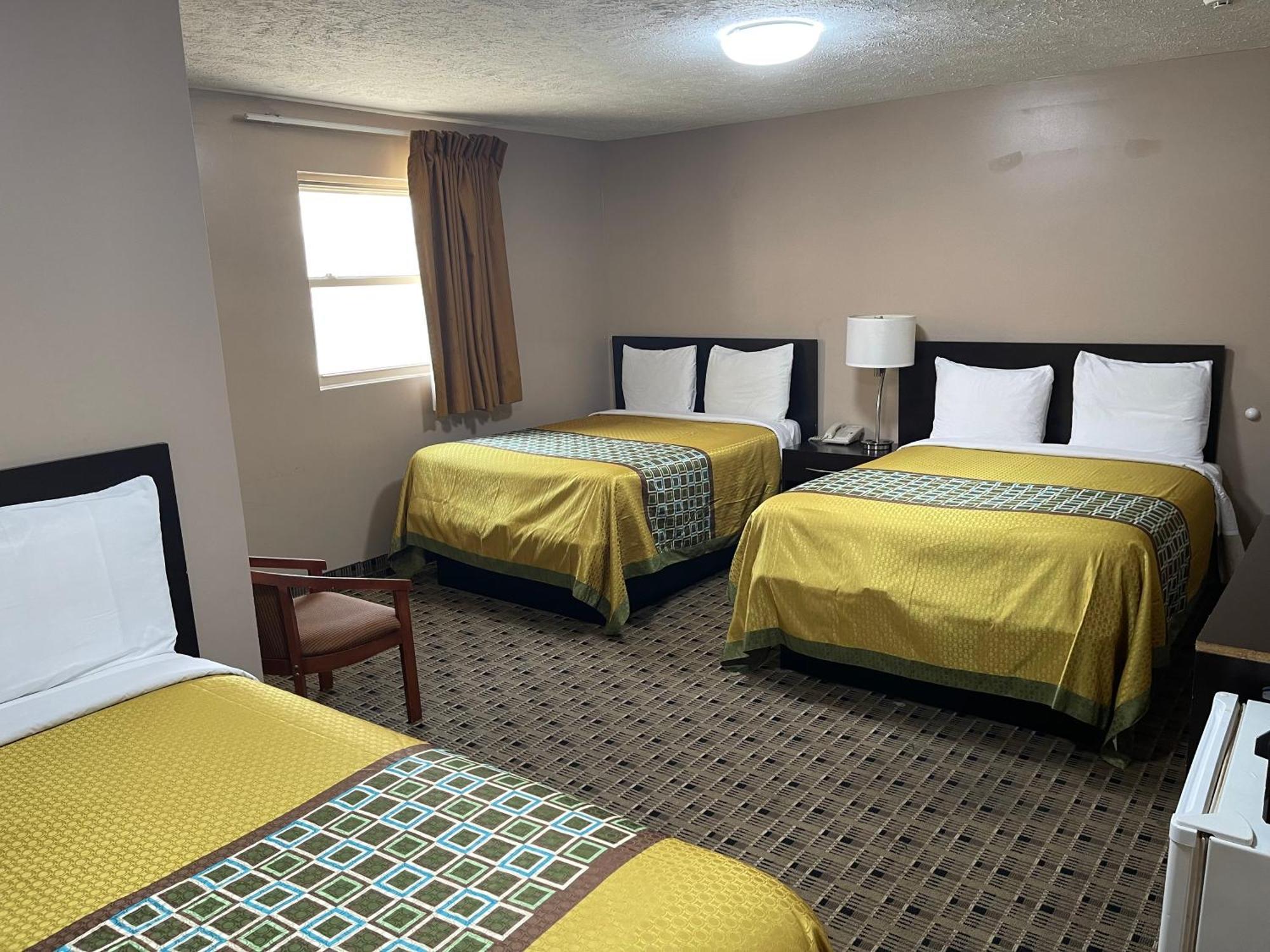 Economy Inn & Suites Ащабюла Екстериор снимка