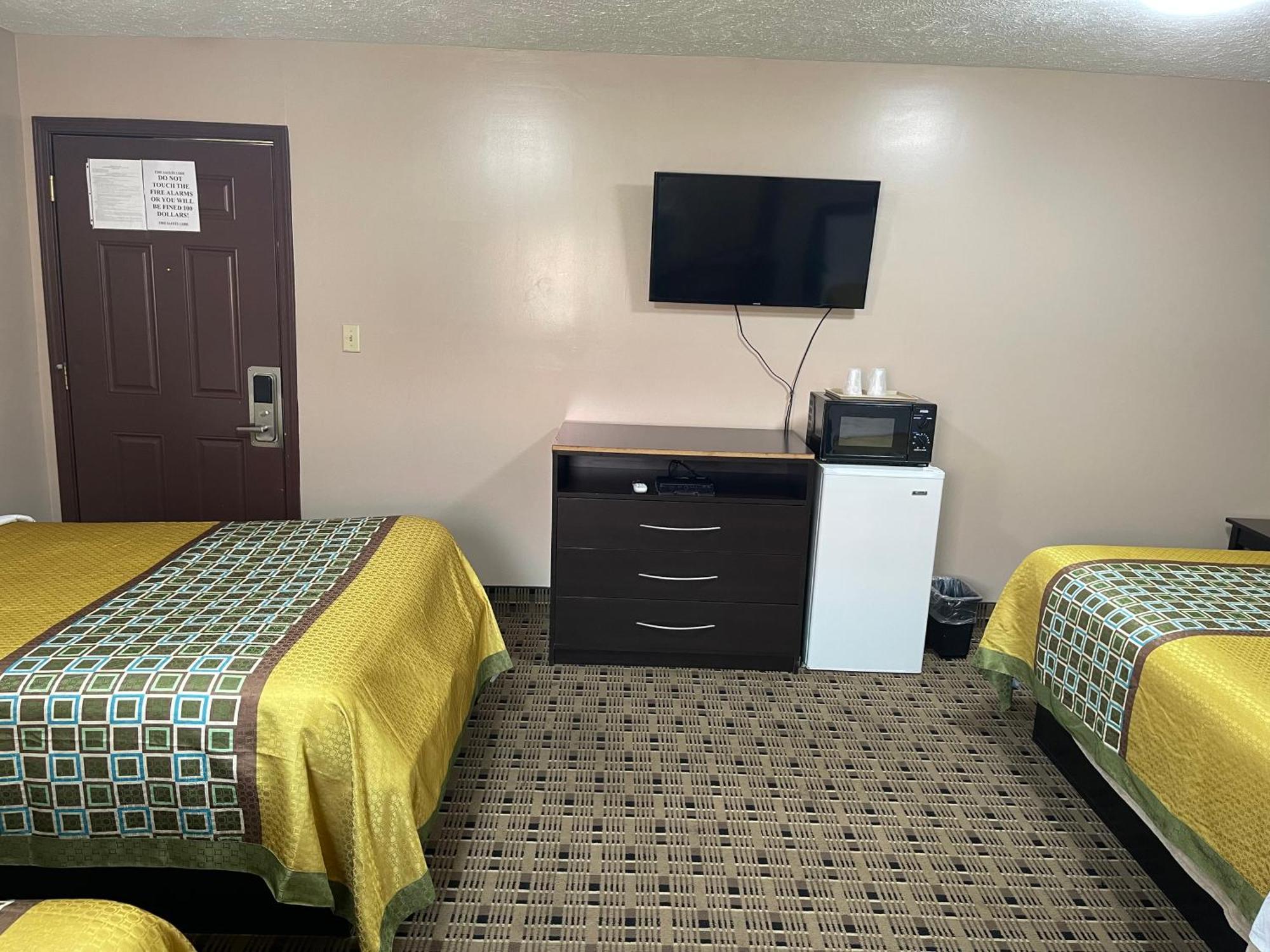 Economy Inn & Suites Ащабюла Екстериор снимка